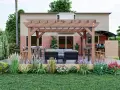 Un espace extérieur invitant avec pergola, salon, table et barbecue. Ce plan cuisine d'été est parfait pour recevoir.