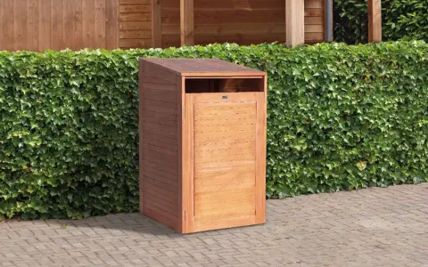 Cache poubelle bois à faire soi-même, discret et esthétique, pour un jardin impeccable.